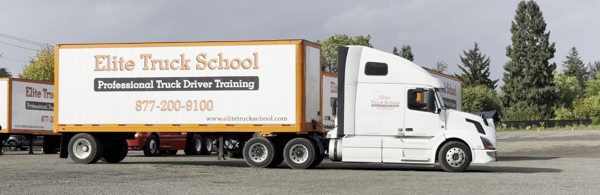 Branded truck maneuvering in the training yard