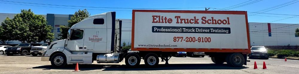 Image of Elite Truck School branded truck in the training yard