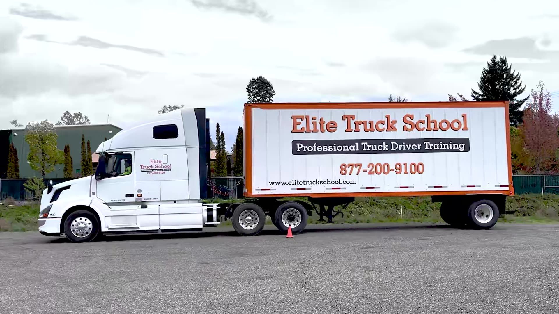 Image of an Elite Truck School semi truck from the side