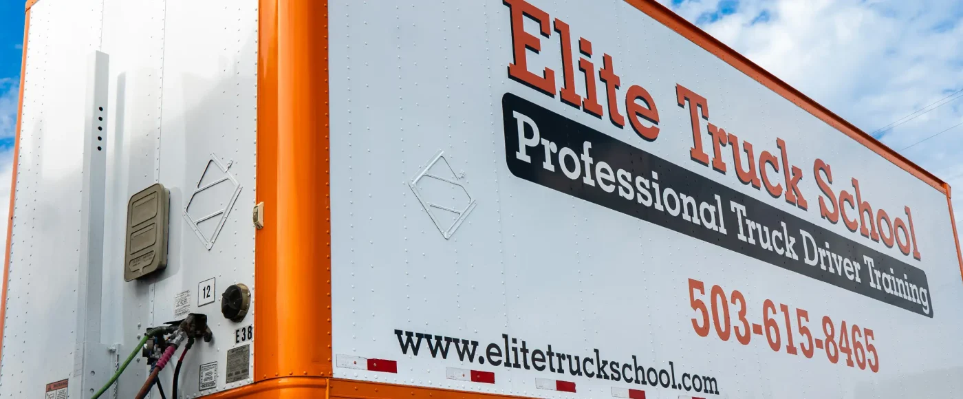 Side view of Elite Truck School trailer